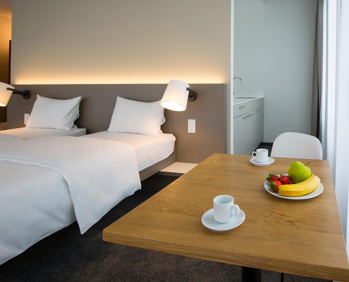 B_Smart Motel Ландкварт Екстериор снимка